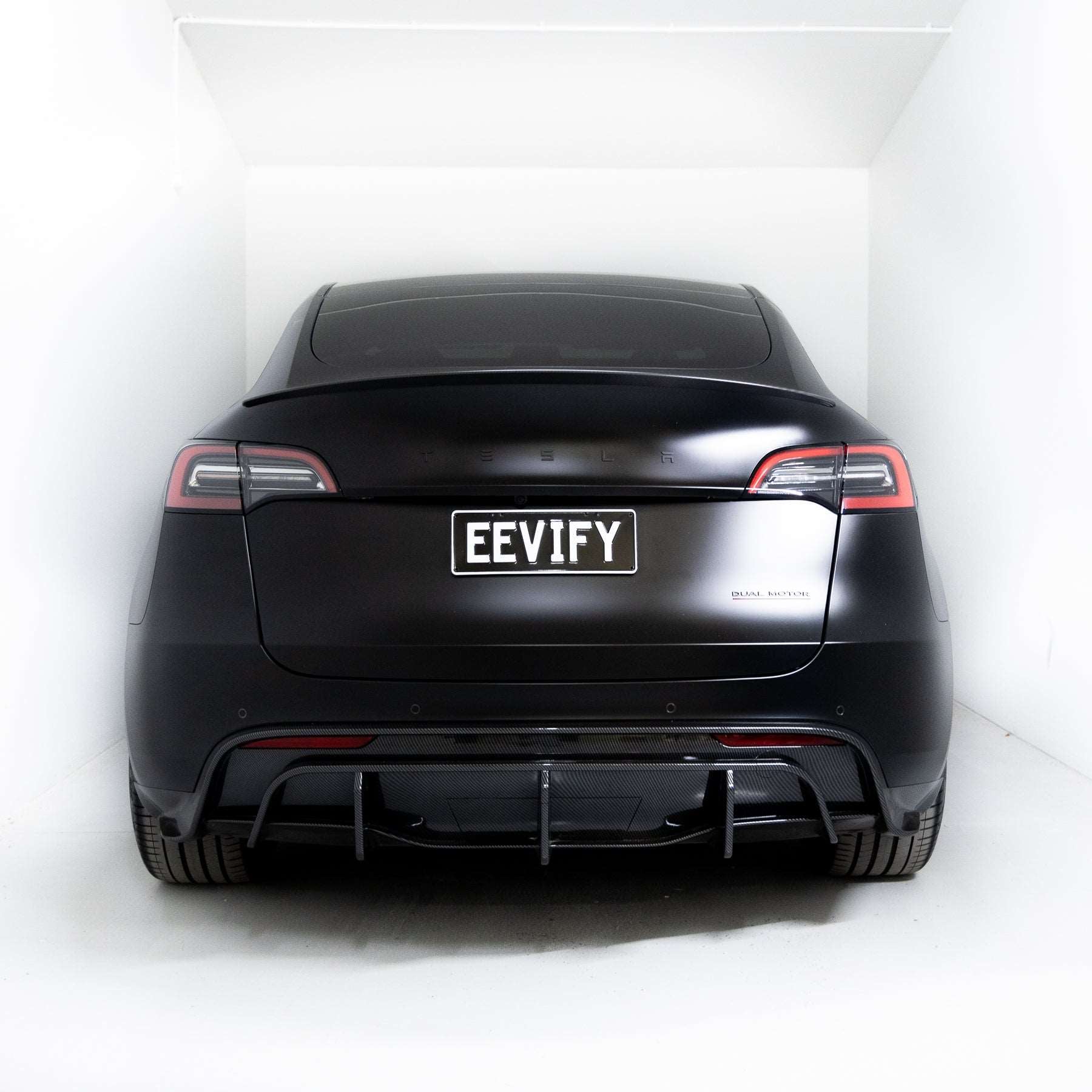 EVF-Style Rear Diffuser Bumper for Tesla Model Y  - Eevify #colour_gloss carbon fibre-style